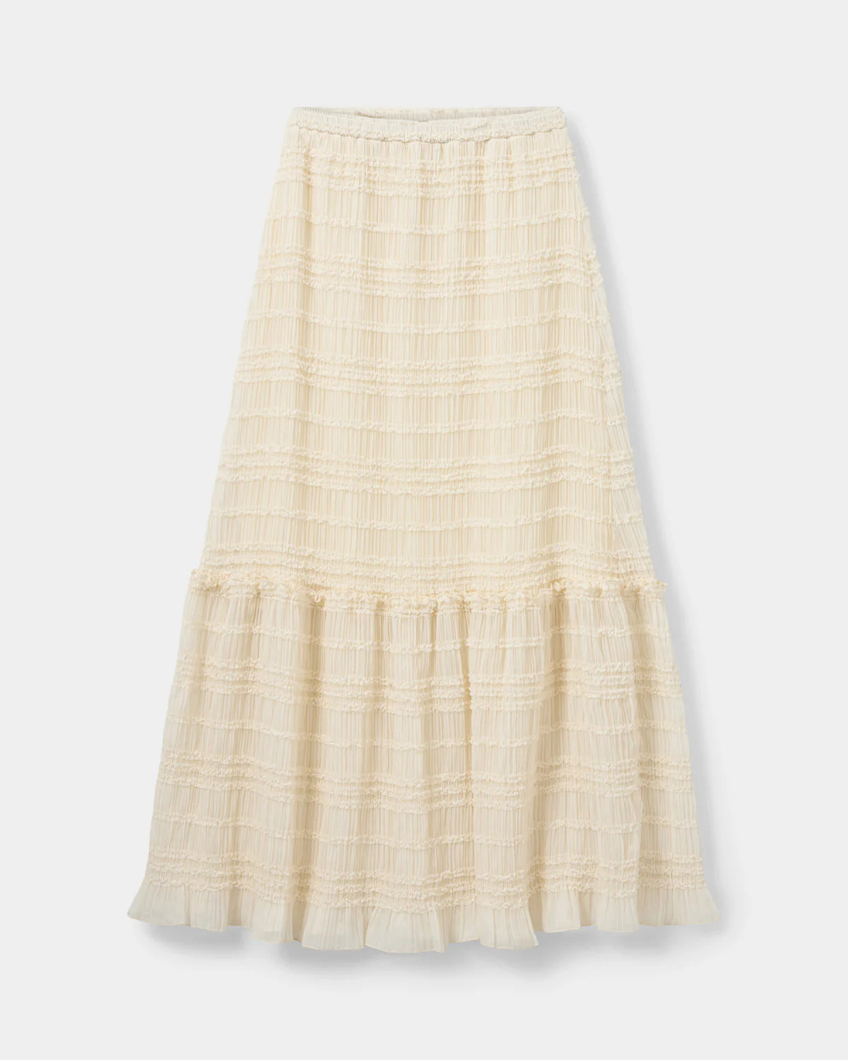 Off white maxi nederdel med struktureret stof, elastik i taljen og bred flæsekant.