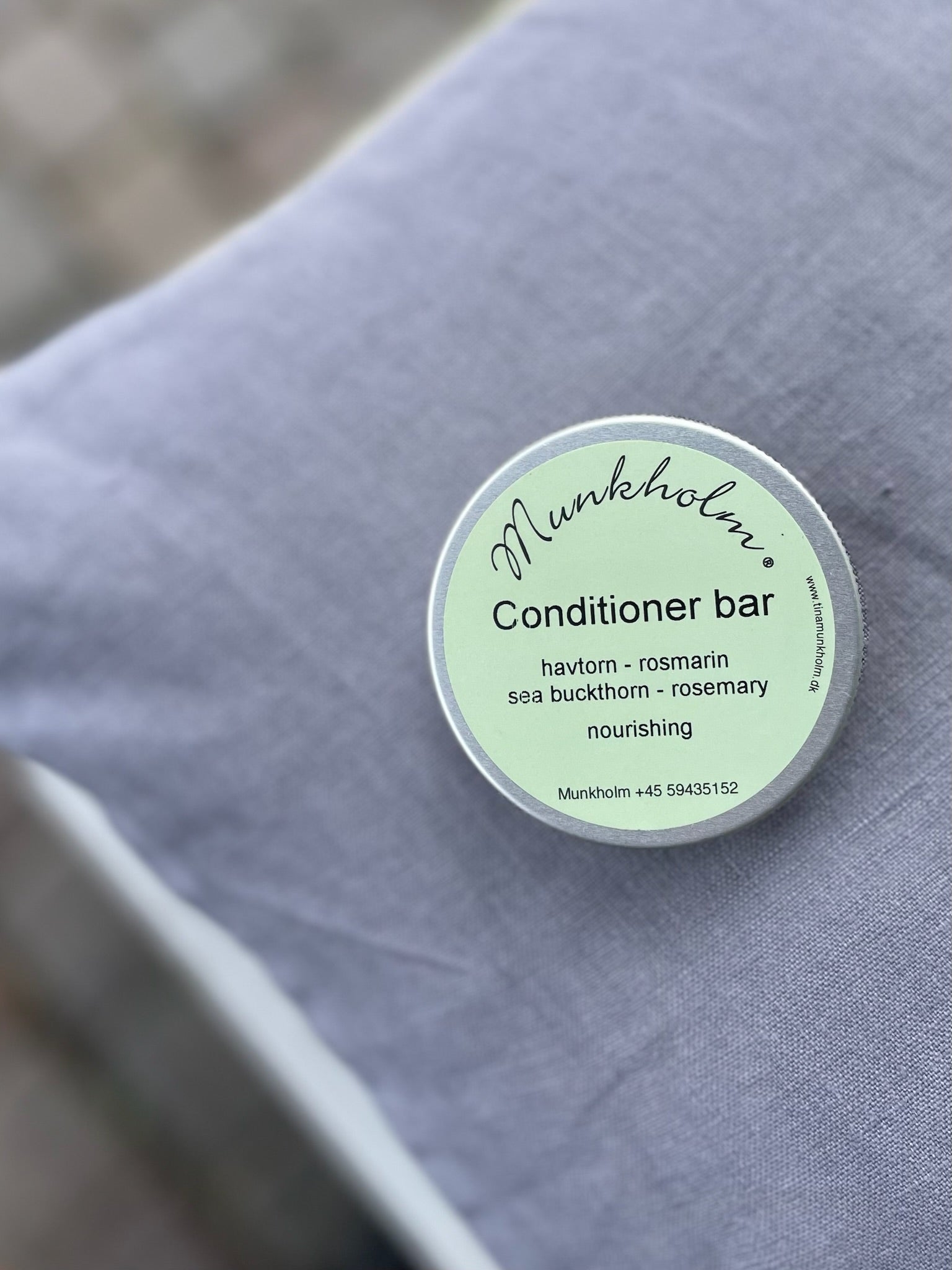 Munkholm conditioner bar med havtorn og rosmarin – fast balsam med naturlig pleje og frisk duft.