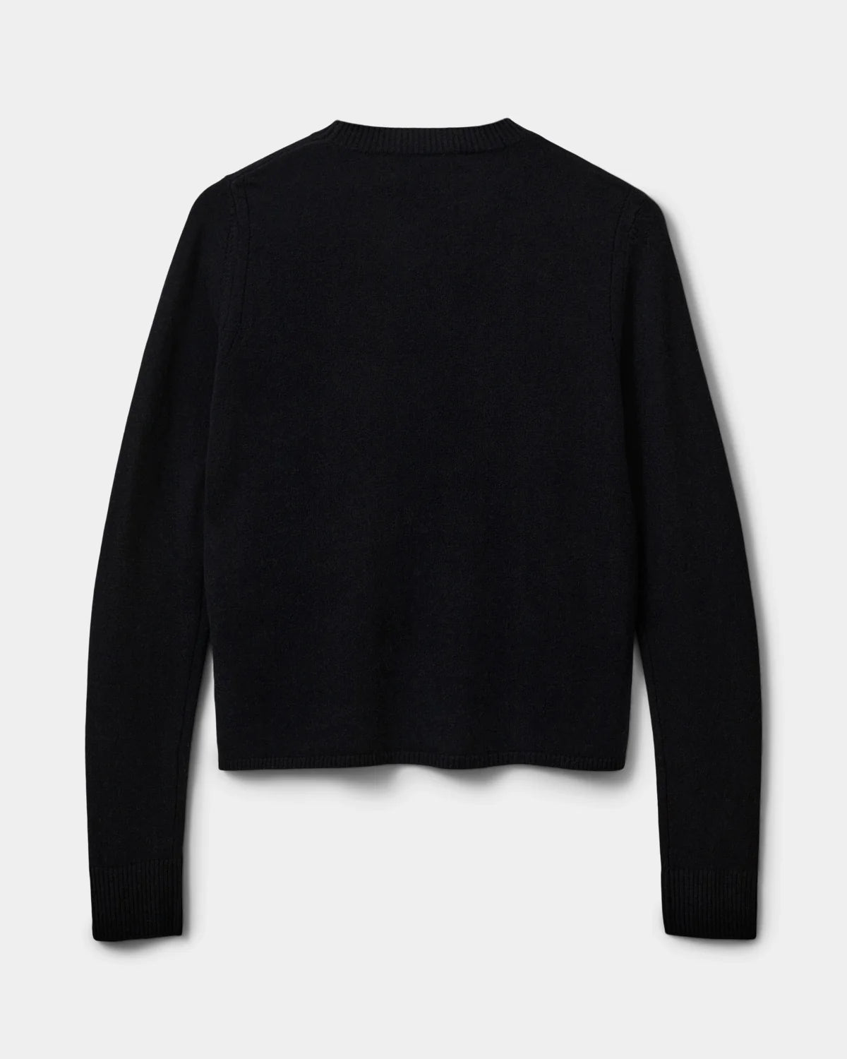 Sort SAISW striktrøje i 100% uld med diagonal sømandsknapdetalje fra Sofie Schnoor