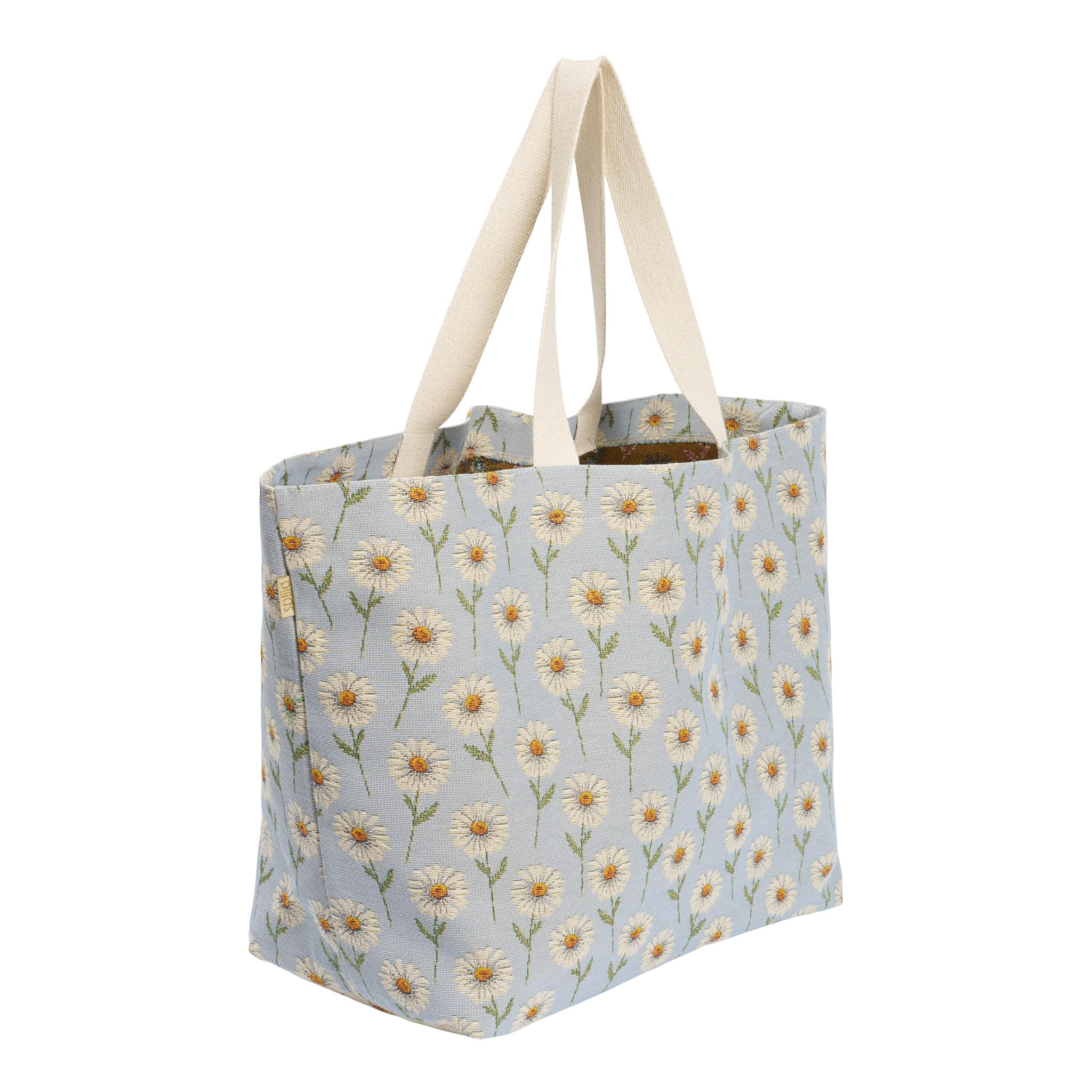 Shopper Margurit Baby Blue i lyseblå gobelin med cremefarvede margueritter – rummelig, vaskbar og perfekt til sommerens mange formål.