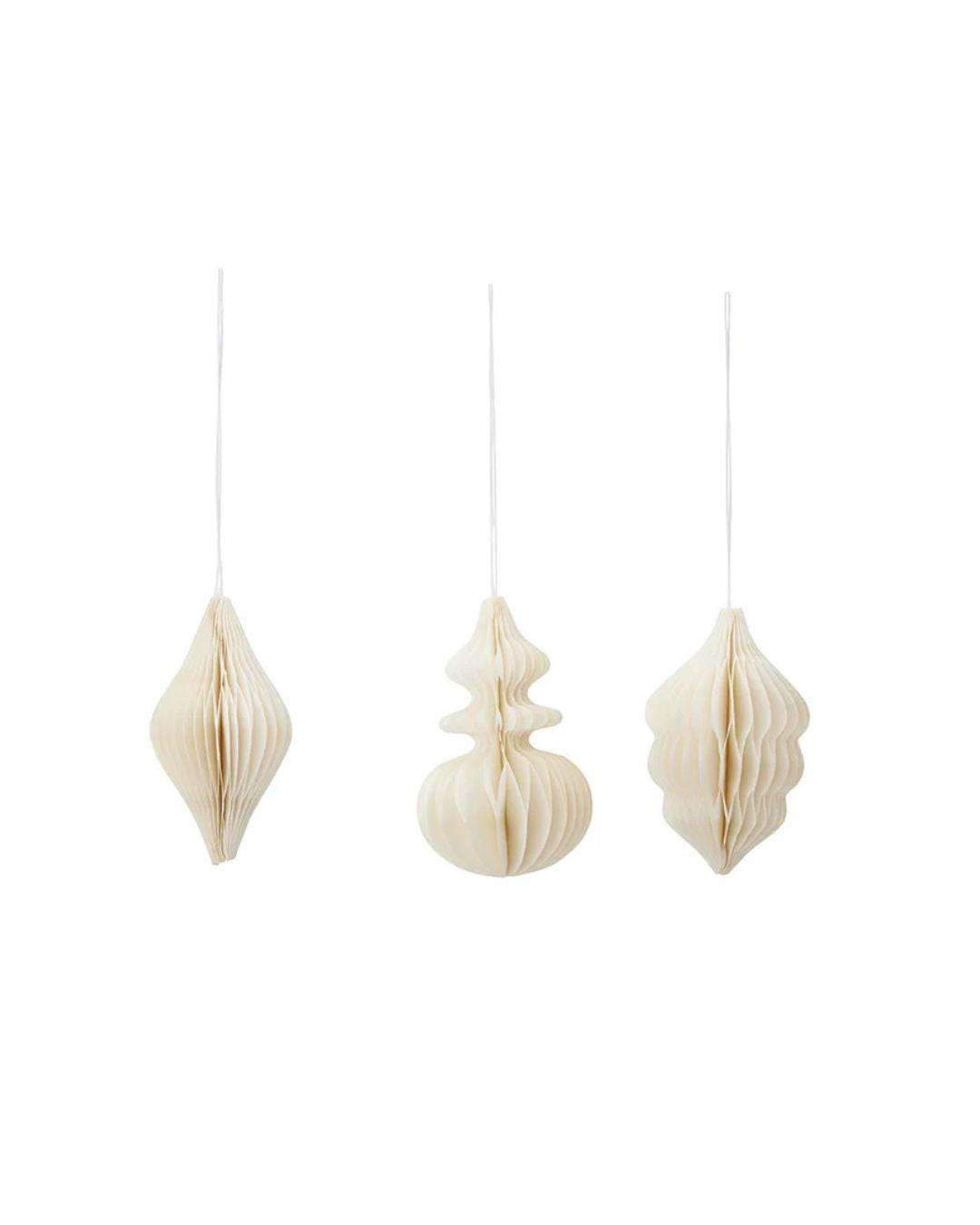 Sæt af tre Honeycomb Deco Isaz i cream-farve, ideelle til juleudsmykning med en 3D-effekt.