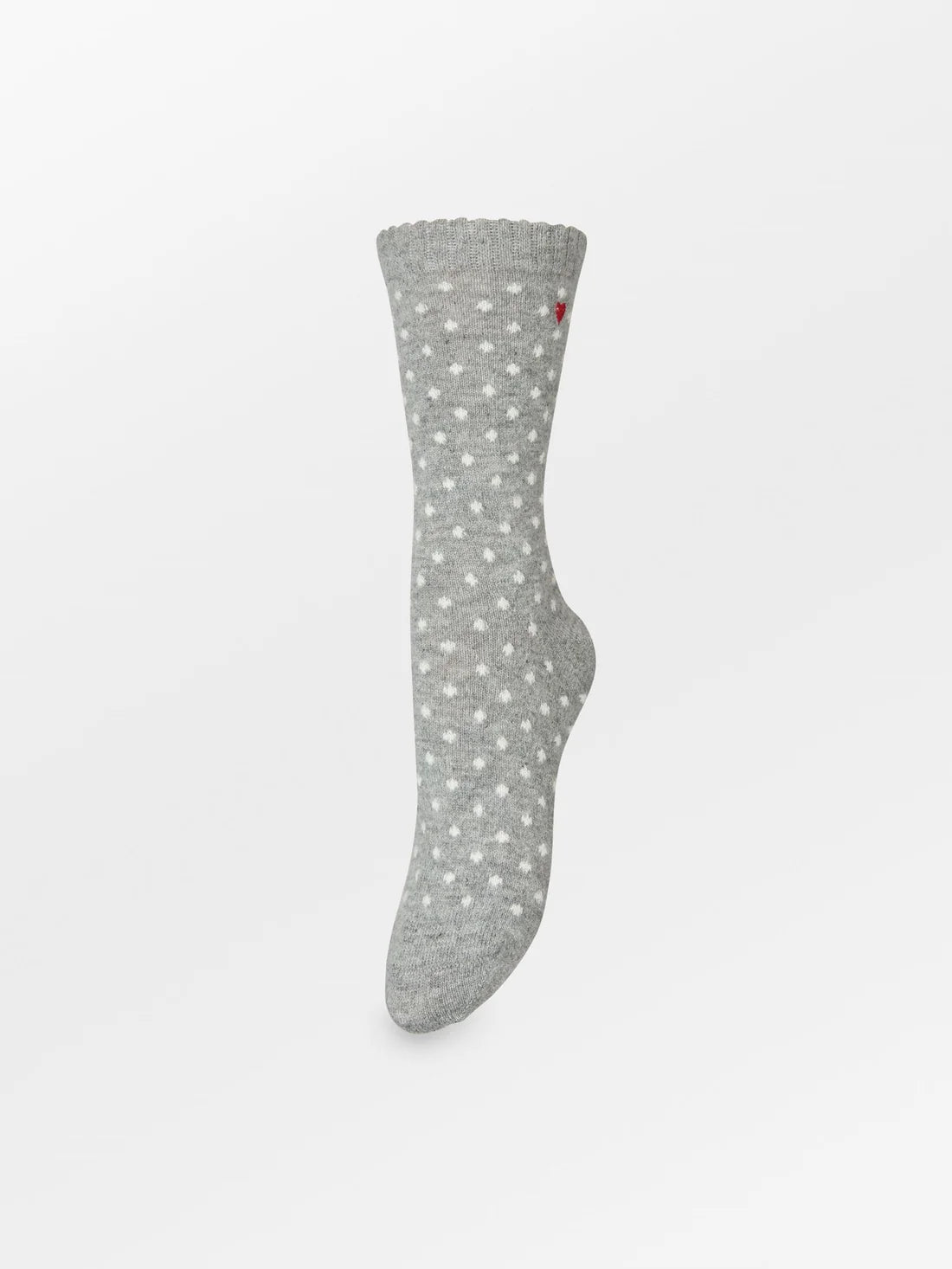 Dotted Wola Sock med prikket mønster i Hot Fudge Brown eller Grey Melange og blød uldblanding.