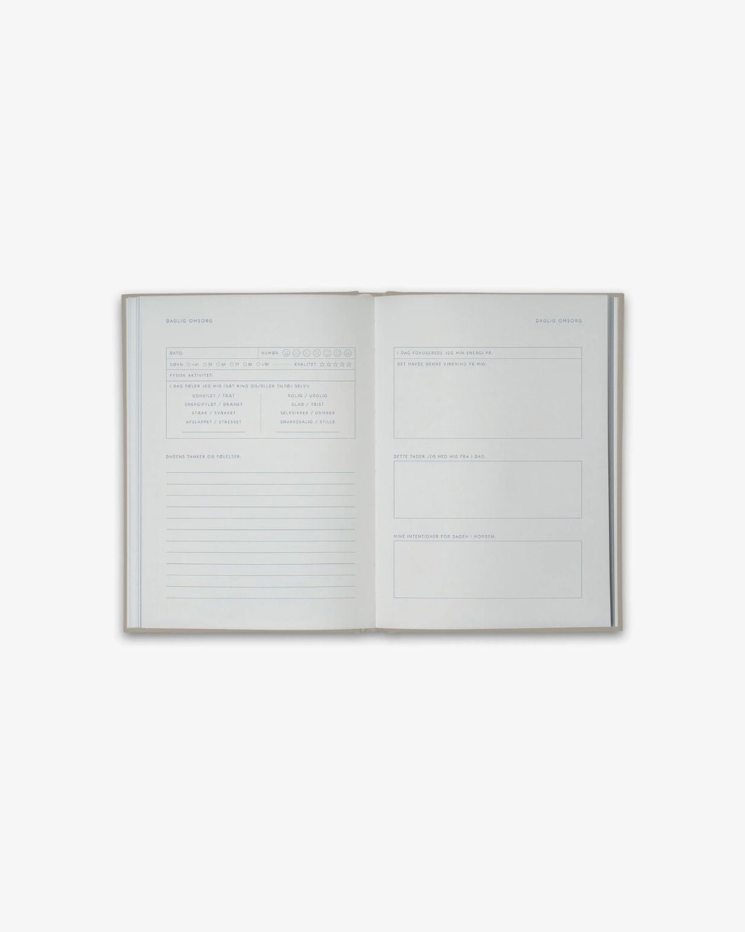 Omsorg Journal – beige, stofindbundet guidet notesbog til daglig refleksion og selvomsorg.