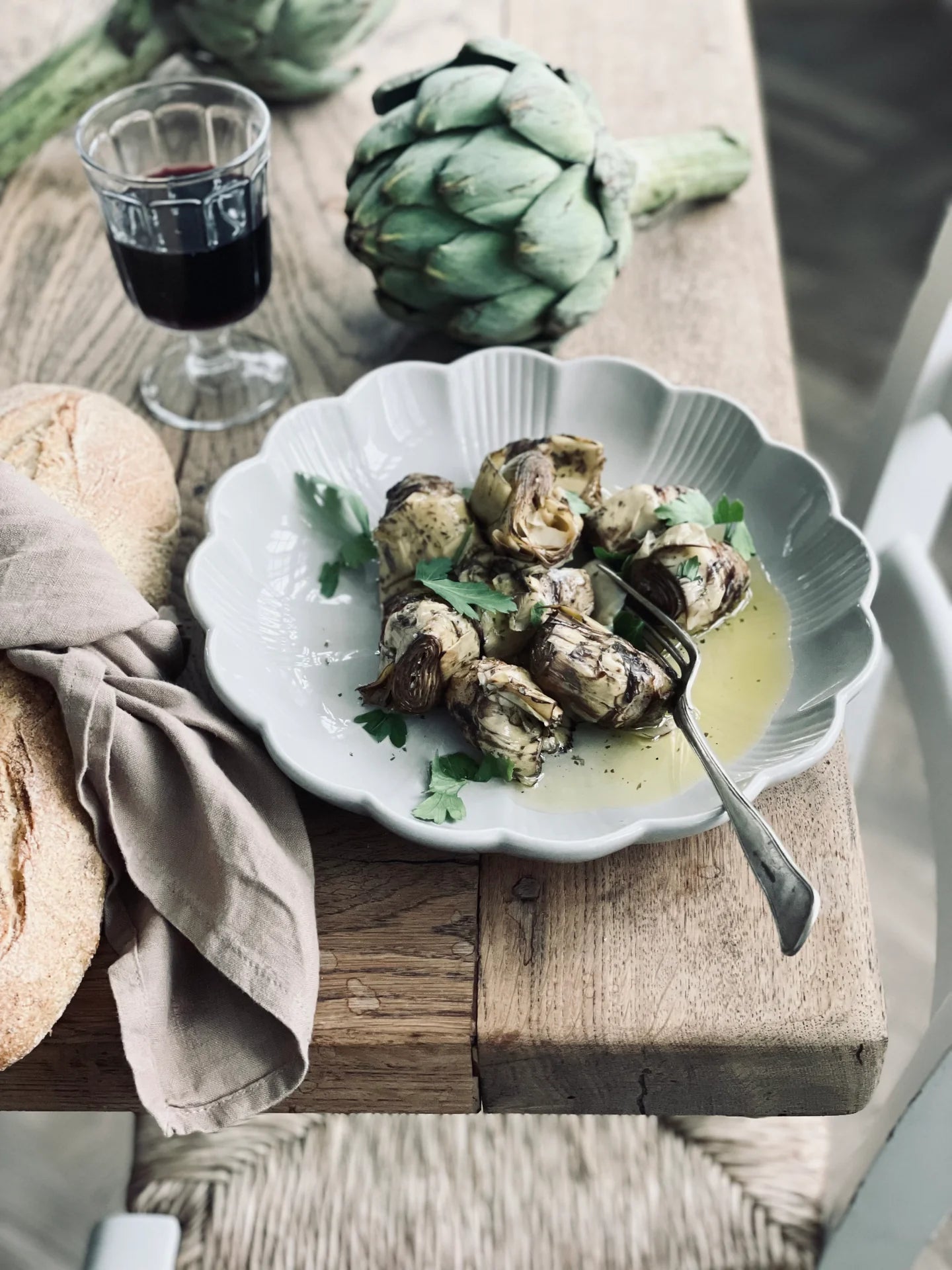 Håndgrillede artiskokker i ekstra jomfruolivenolie – perfekt til antipasti, pizza, pasta og risotto.