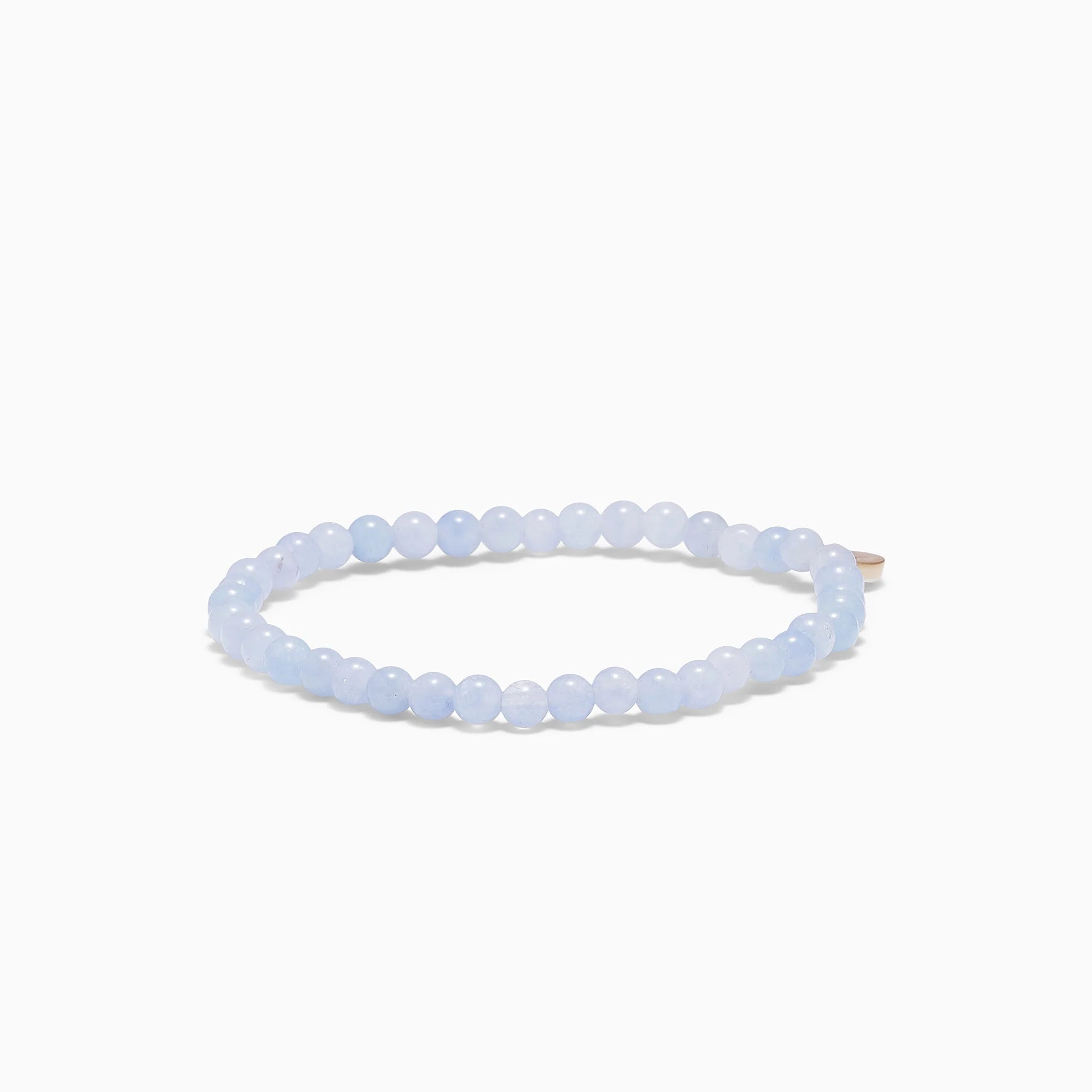 Petite aquamarine stretch armbånd fra Soï Copenhagen med lyse blå sten og elegant minimalistisk design