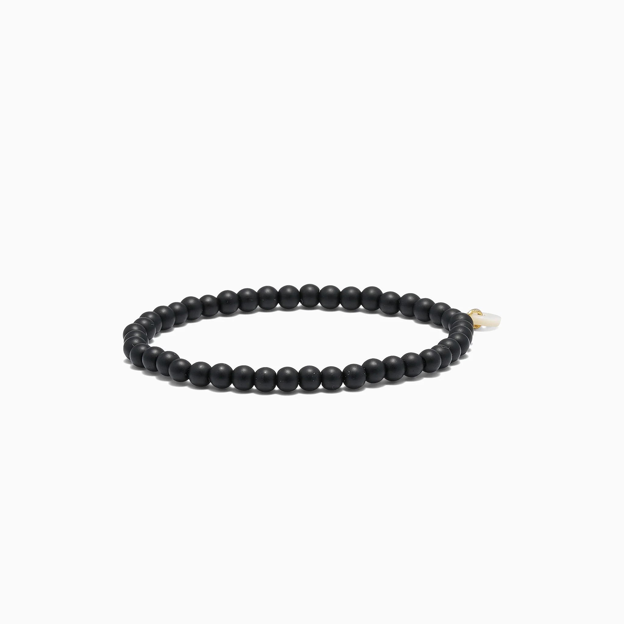 Petite Blackstone Stretch Armbånd med sorte Blackstone-sten og 18k forgyldt rustfrit stål.