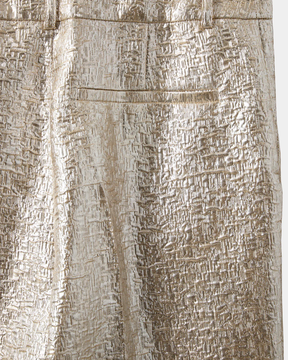 Guldfarvede bukser fra Sofie Schnoor med metallisk finish – perfekte til fest og nytår, køb hos butikalrum.dk