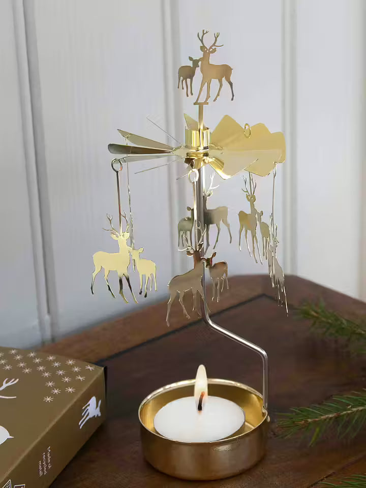 Englespil med rensdyr og kid i guld – dekorativ julepynt, drejer rundt ved fyrfadslys, fra Butikalrum.dk på Amagerbro