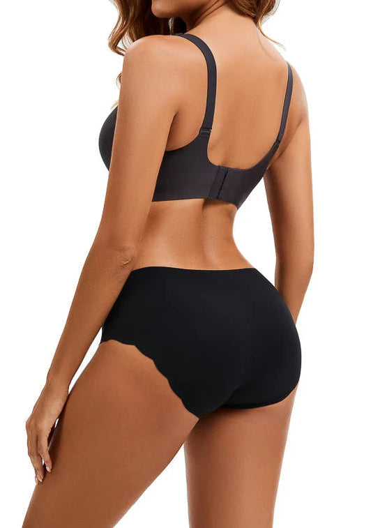 Invisible Sømløs Tai Trusse i sort fra FemiFemme med seamless design og ultrablød komfort – køb hos Butik Alrum på Amager eller online på butikalrum.dk.