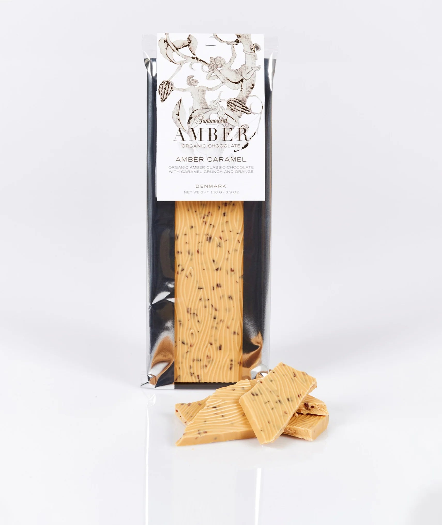 Amber Classic chokoladebar med appelsin og knuste karamelflager – gylden, sprød og frugtig.